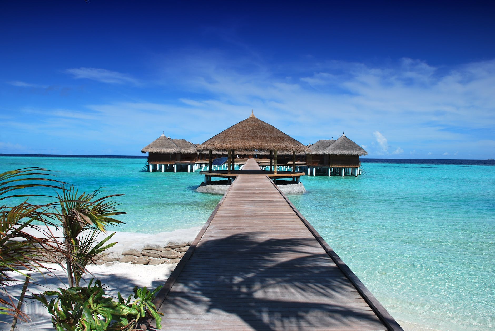 maldives-ile-beach-sun-38238 brown hut island gazebo